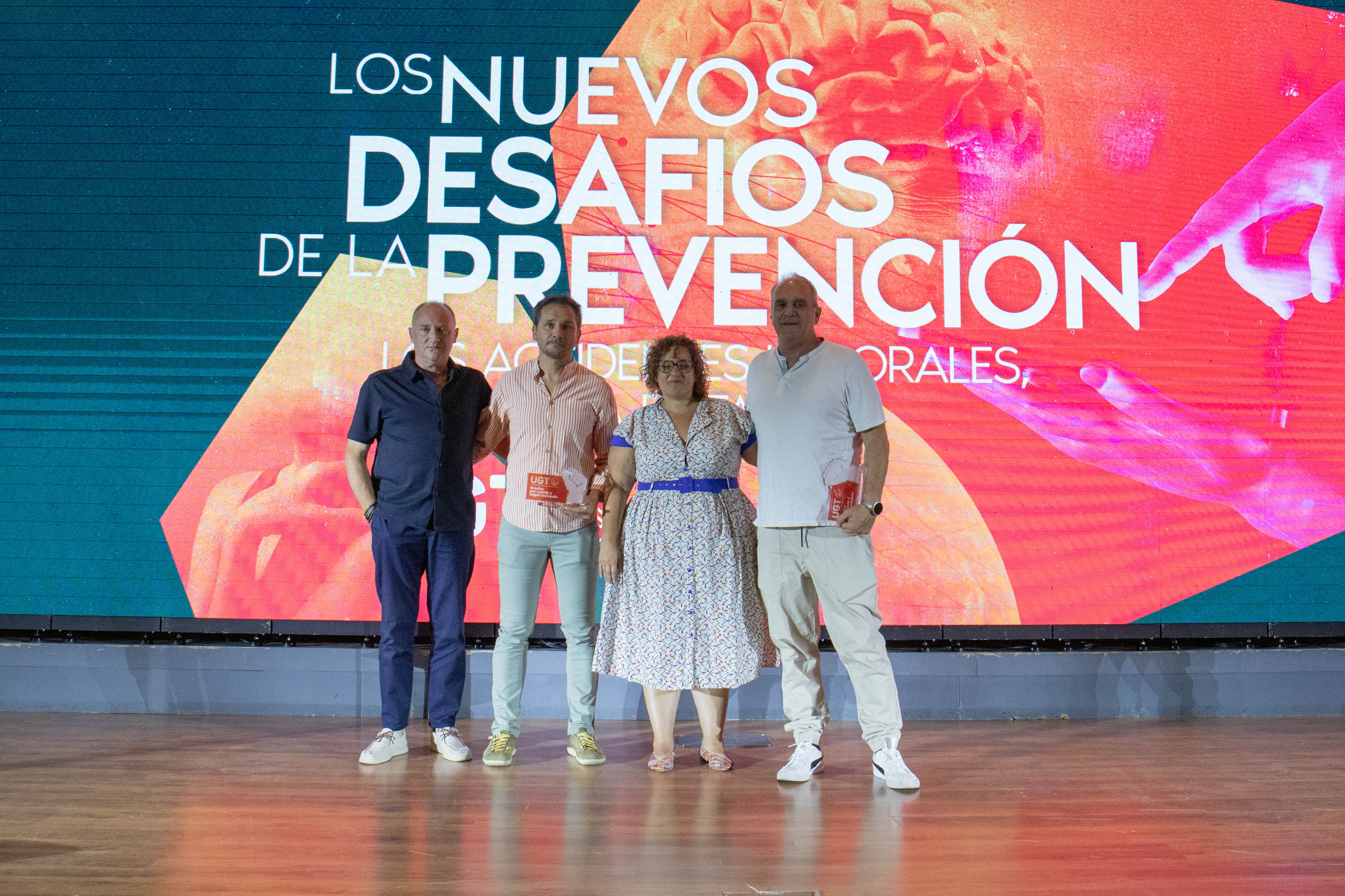 Entrega de premios: Santiago de Nova, vigilante de seguridad; Catalino Nalón, minero SOMA Sindicato de Obreros Mineros de Asturias; Ángel Rubio Gómez, bombero Forestal